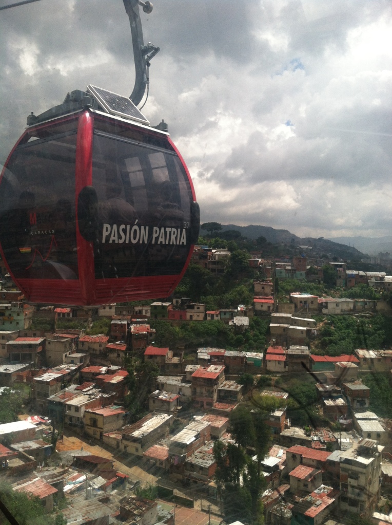 One of the MetroCable Cars. This one says Pasión Patria, or Passion for the Fatherland. Others say "Love," "Freedom," etc.